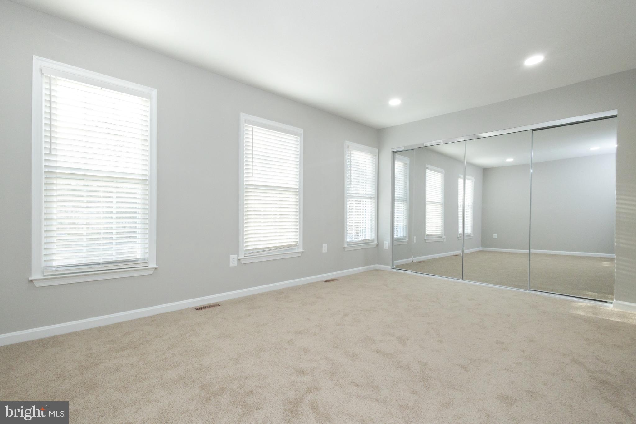 8058 Felecity Court Springfield, VA 22153 - Photo 24 of 35 a view of an empty room with a window
