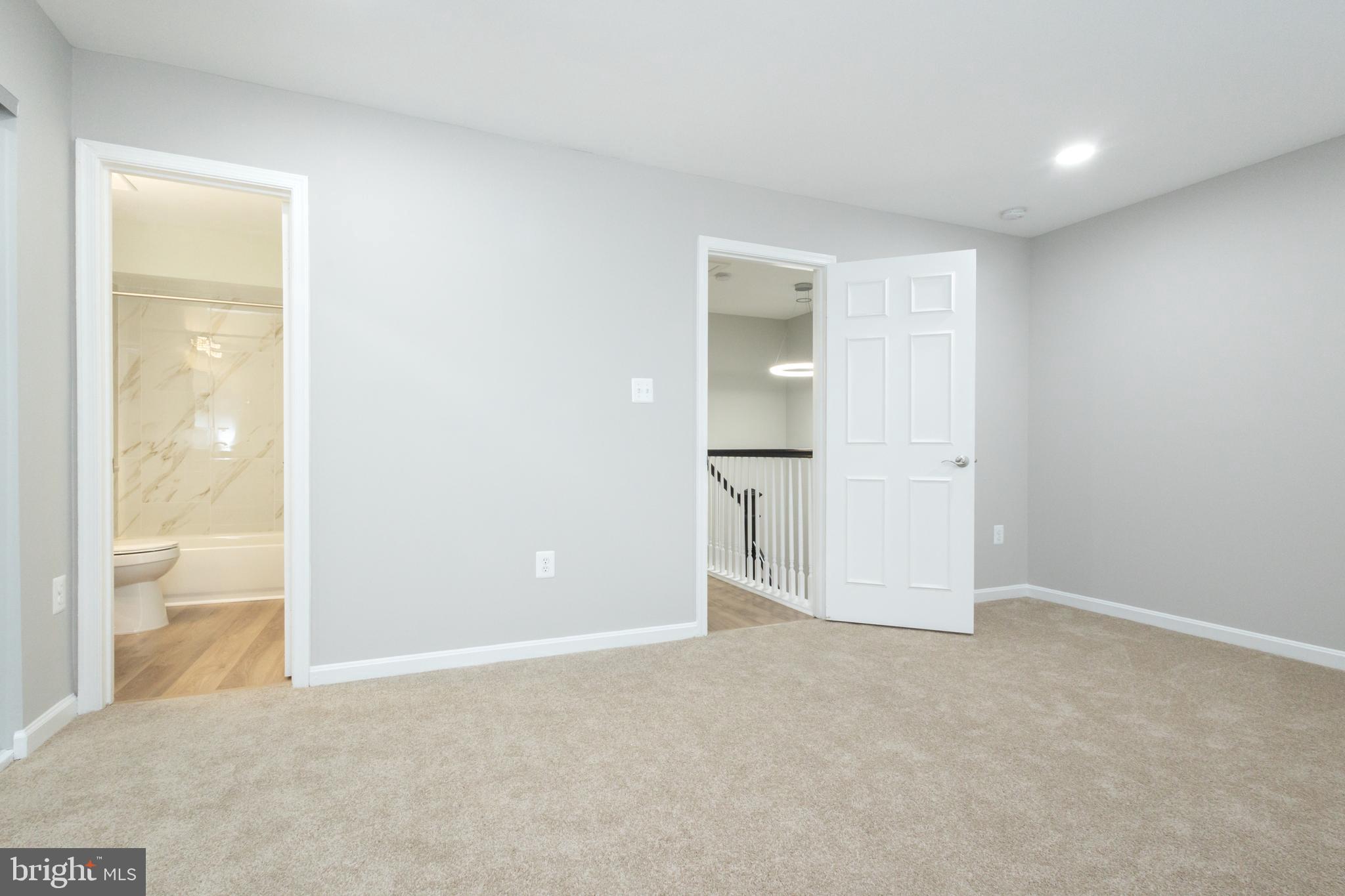 8058 Felecity Court Springfield, VA 22153 - Photo 26 of 35 a view of an empty room and closet area