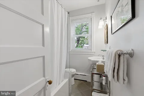 a bathroom with a sink and a toilet