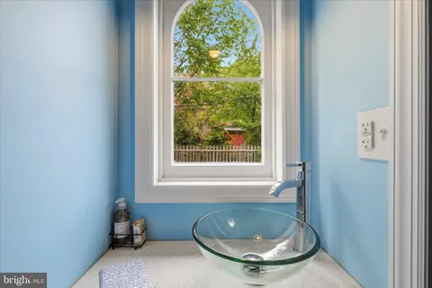 a room with a window and tub