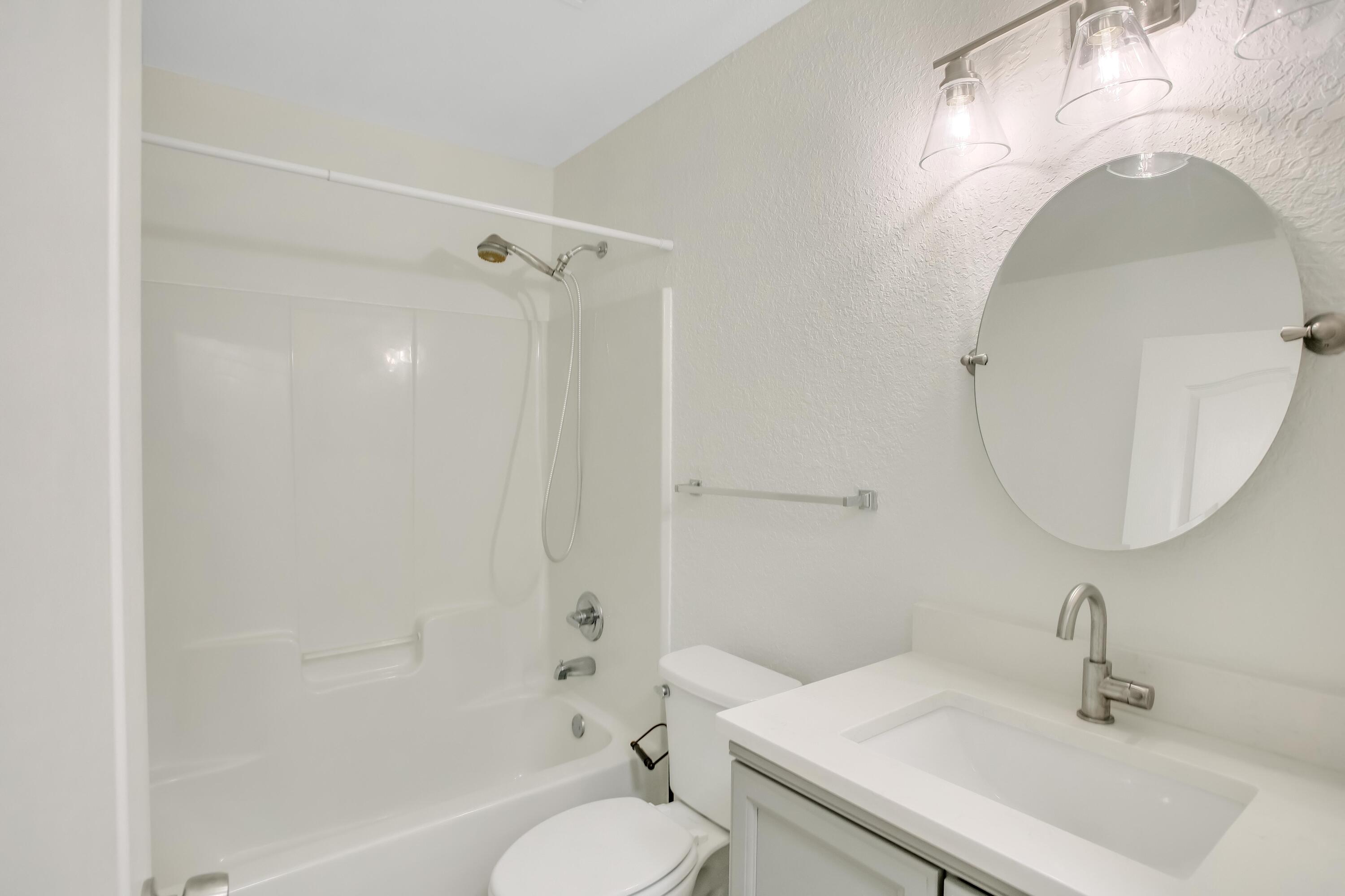 284 Shipwreck Road Santa Rosa Beach, FL 32459 - Photo 25 of 43 a bathroom with a sink toilet and shower
