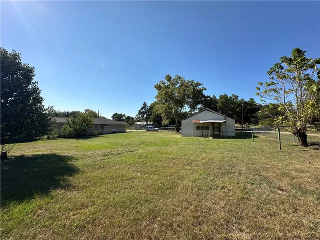 a house with trees in front of it
