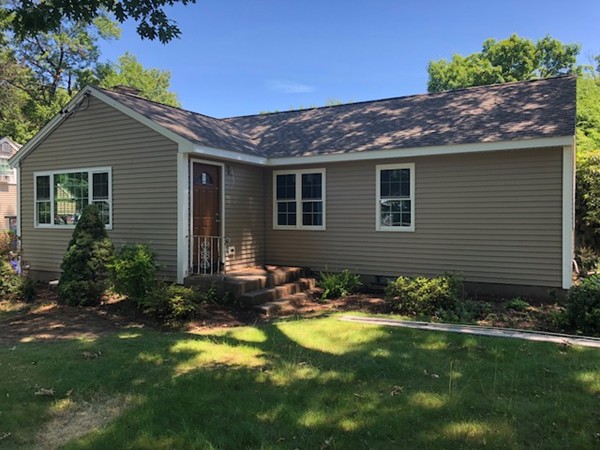 72 Greaney Street Springfield, MA 01104 - Photo 1 of 1 a view of a house with pool and garden