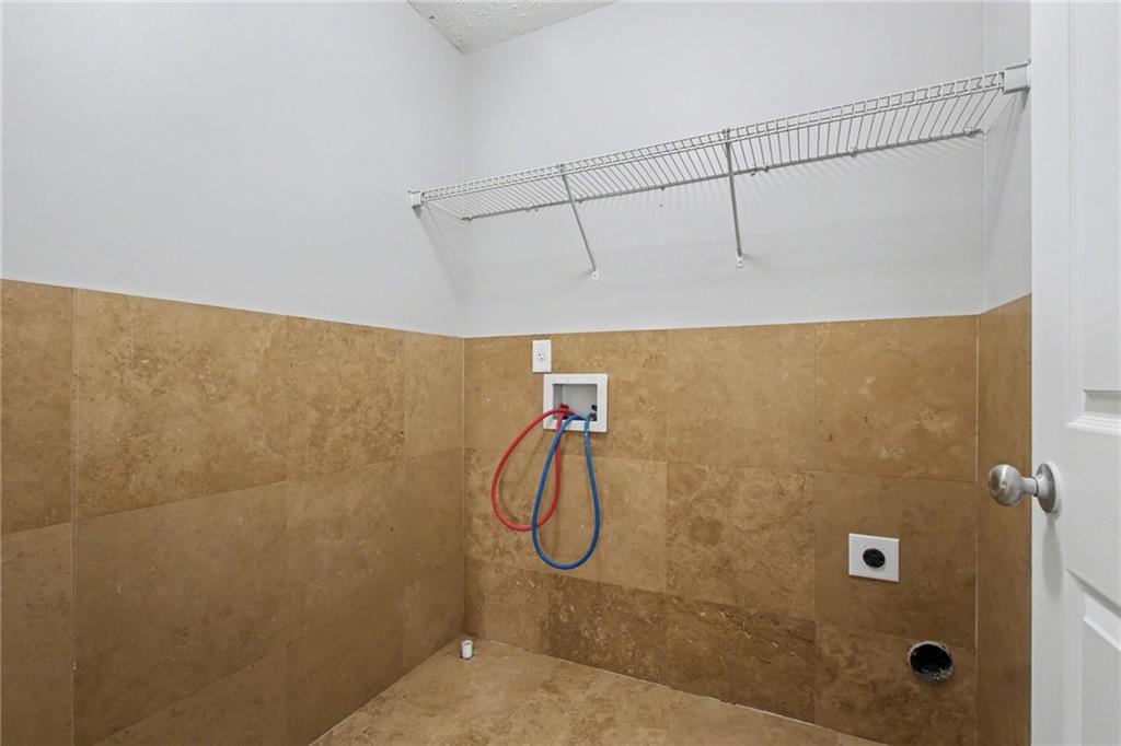 1259 Maxey Court Winder, GA 30680 - Photo 23 of 30 a bathroom with a shower
