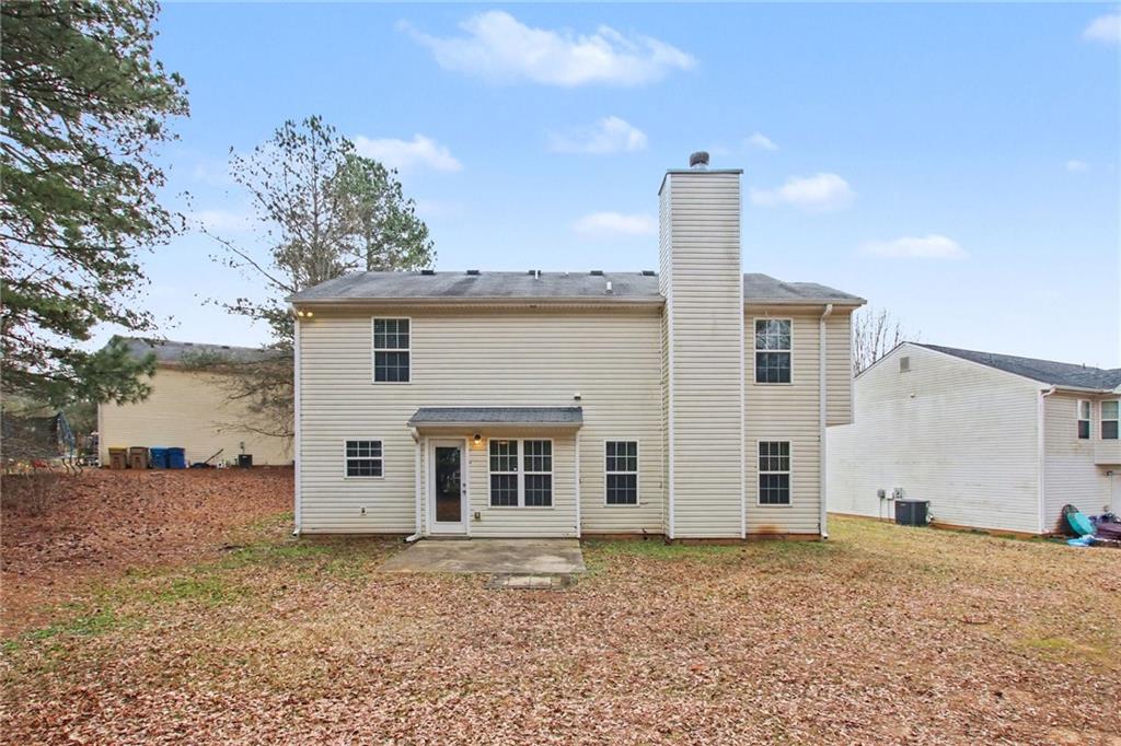 1259 Maxey Court Winder, GA 30680 - Photo 24 of 30 a view of a house with a backyard