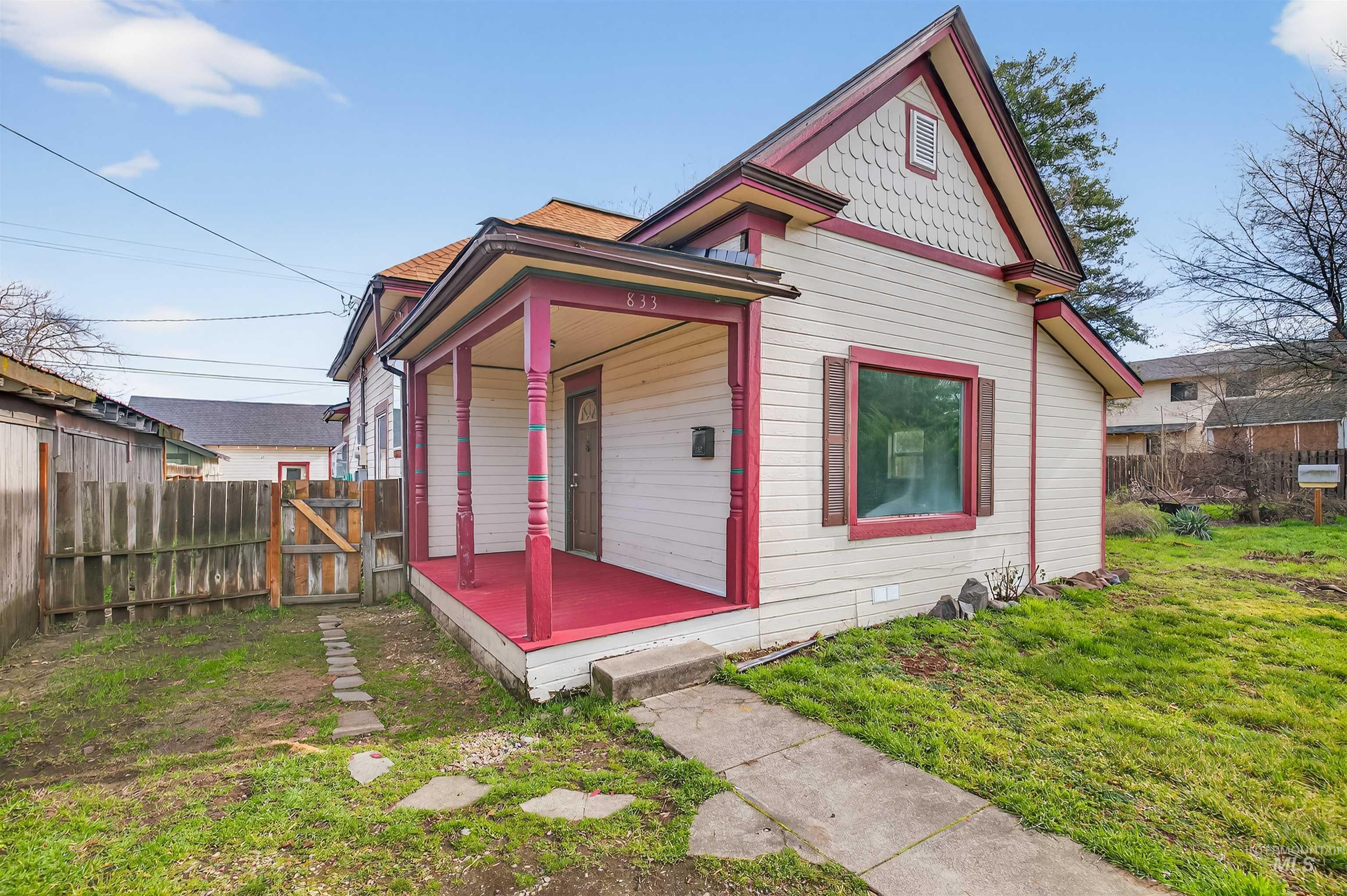 833 8th Street Clarkston, WA 99403 - Photo 1 of 40 Victorian house featuring a gate, a fenced backyard, and a porch