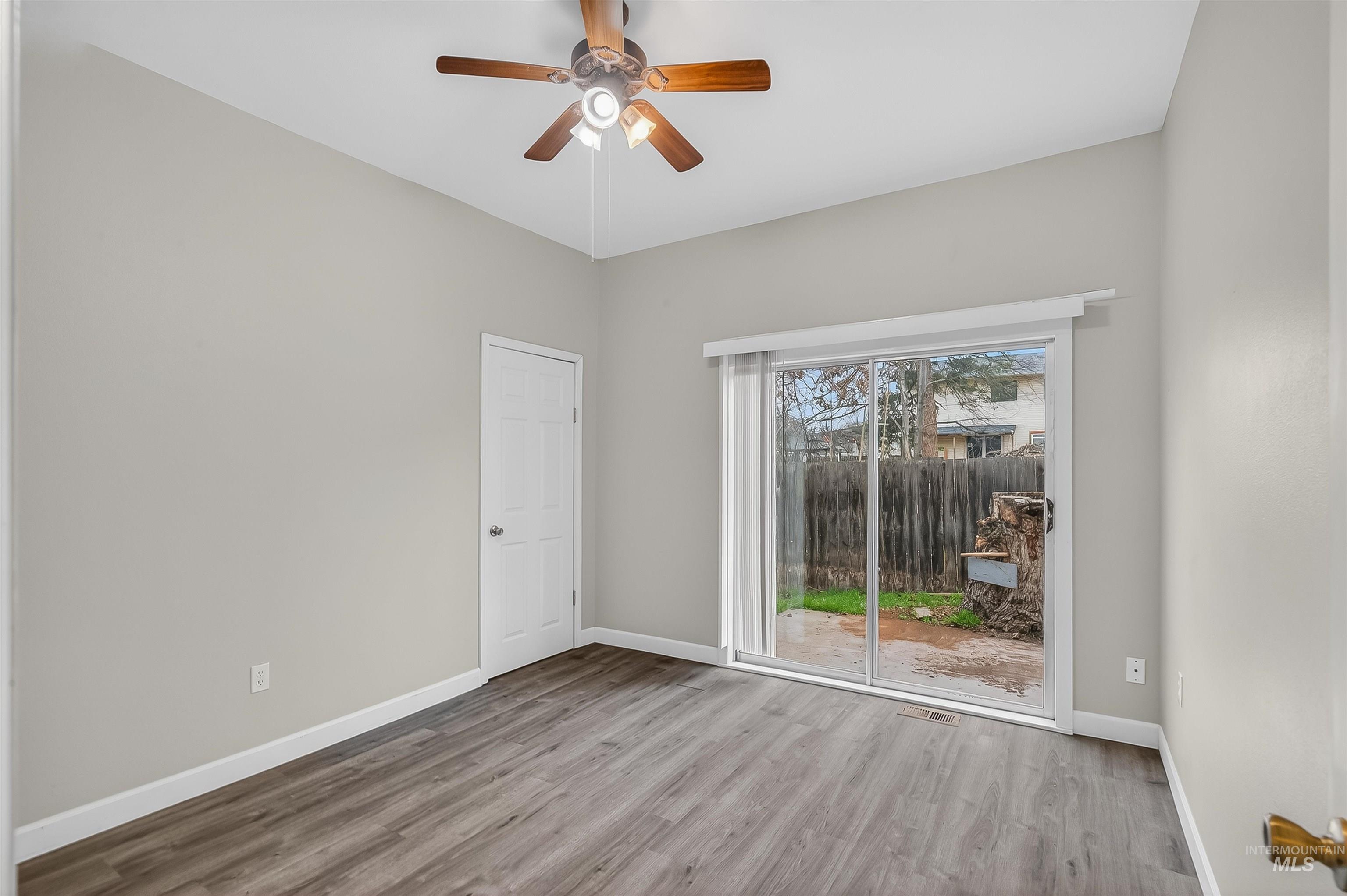 833 8th Street Clarkston, WA 99403 - Photo 22 of 40 Empty room featuring light wood-style flooring and ceiling fan
