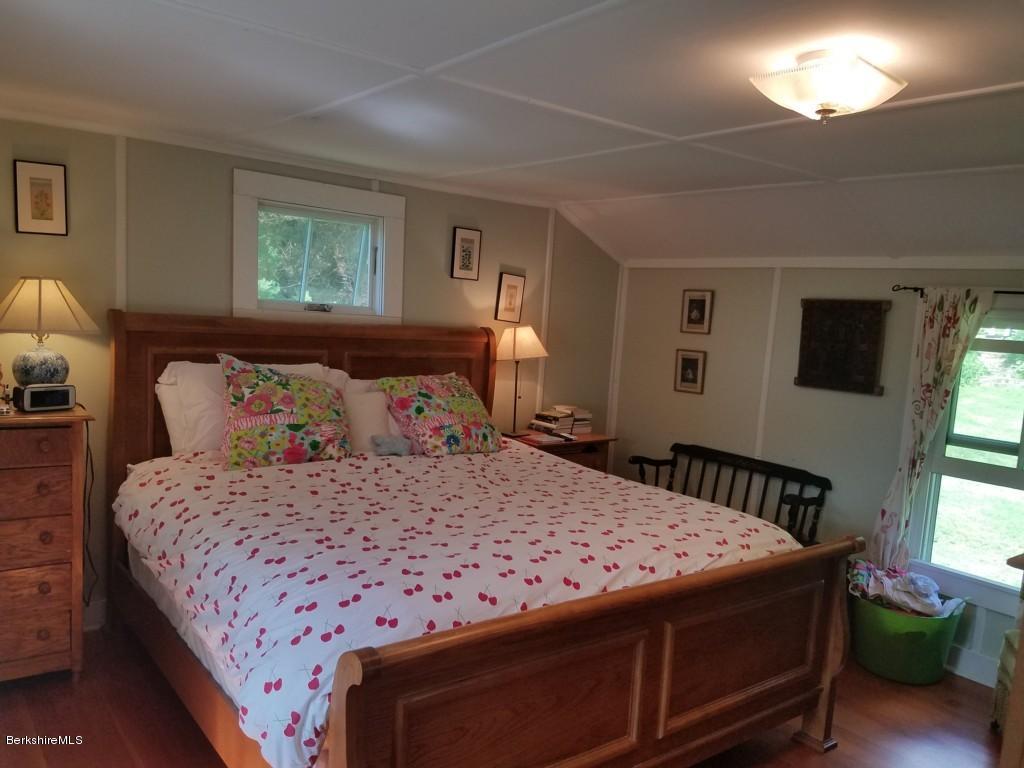 830 E Road Clarksburg, MA 01247 - Photo 14 of 30 a bedroom with a bed and a window