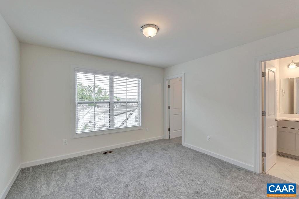 3267 Horizon Road Charlottesville, VA 22902 - Photo 18 of 29 an empty room with windows and closet