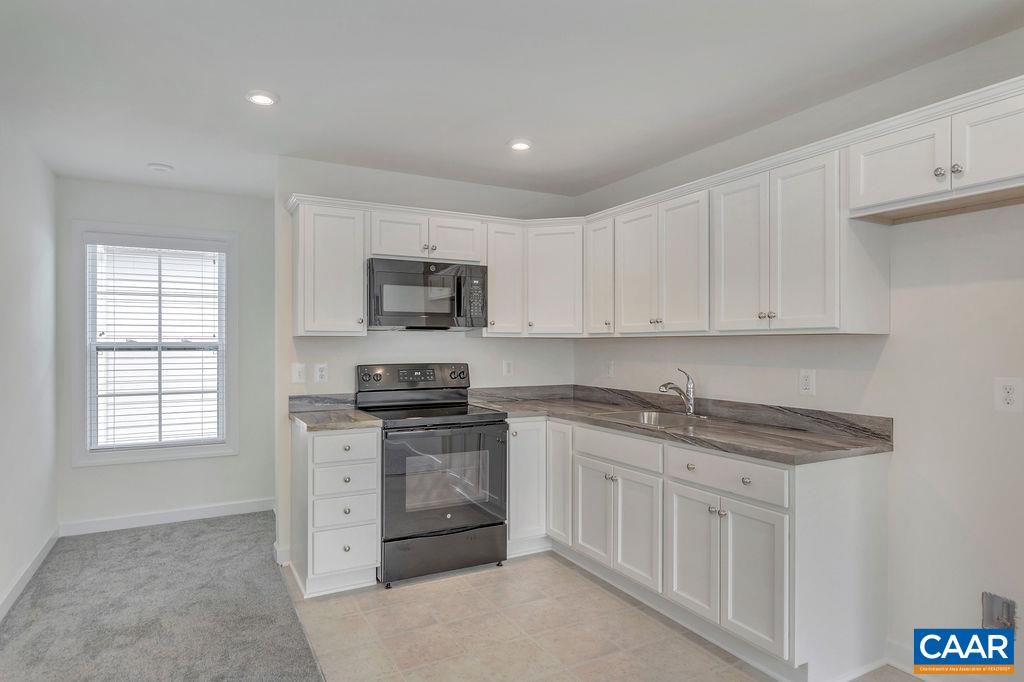 3267 Horizon Road Charlottesville, VA 22902 - Photo 21 of 29 a kitchen with stainless steel appliances granite countertop a sink dishwasher a stove and a refrigerator with wooden cabinets