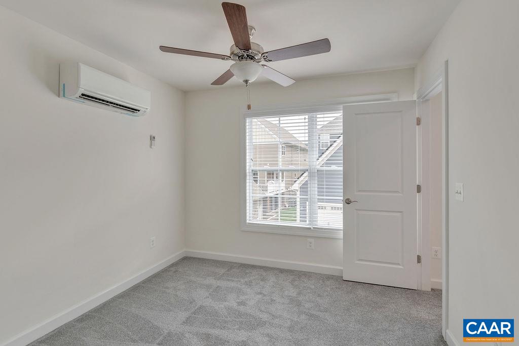 3267 Horizon Road Charlottesville, VA 22902 - Photo 23 of 29 a view of an empty room with a window