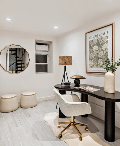 a kitchen with white cabinets and appliances