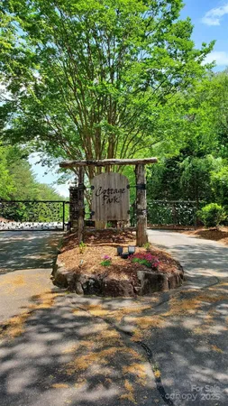 a wooden bench sitting next to a lake