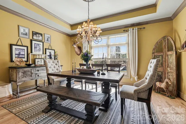 a open kitchen with stainless steel appliances granite countertop a stove and a refrigerator