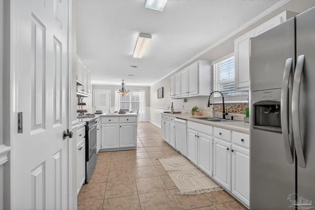 a bathroom with a toilet and a vanity