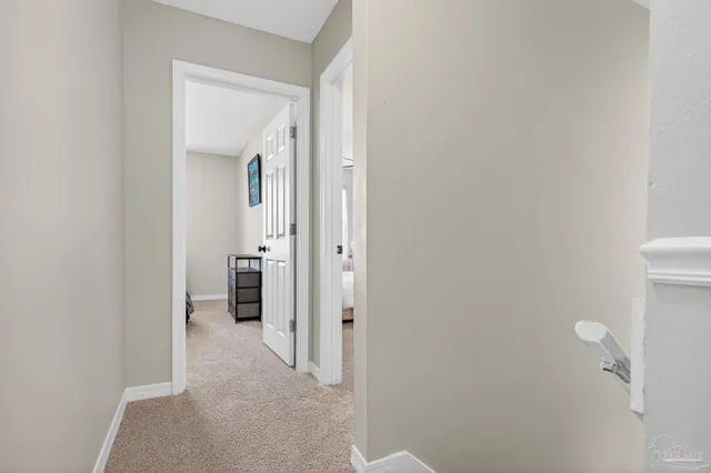 a bedroom with a bed and a lamp with window