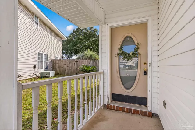 a view of a hallway with entryway
