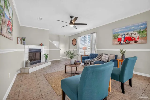 a living room with furniture and a window