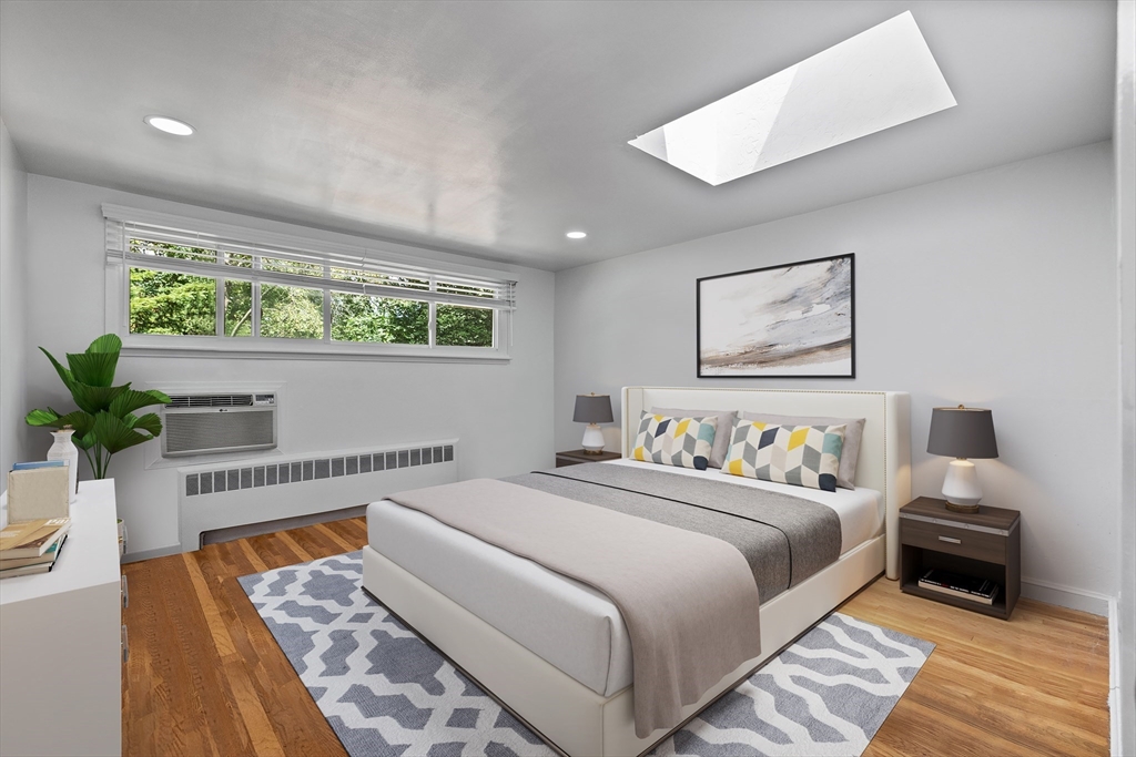 11 Patterson Road, Unit SF Lexington, MA 02421 - Photo 14 of 26 a bedroom with a bed and a window