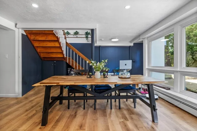 a view of a dining room with furniture window and outside view