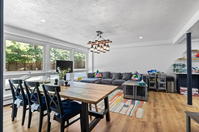 a bathroom with a toilet a sink and a mirror