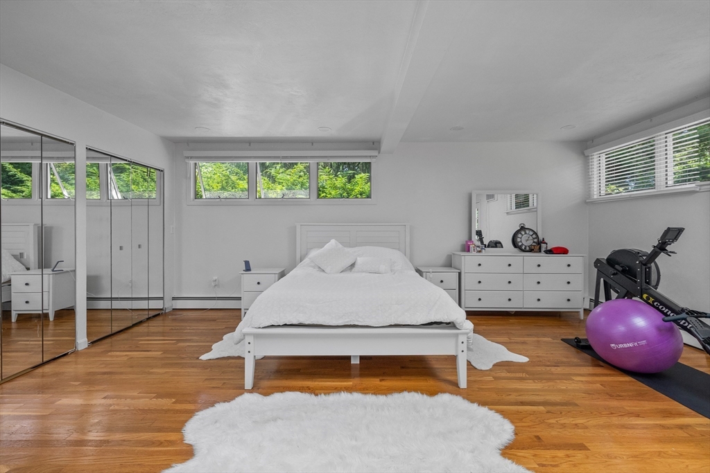 11 Patterson Road, Unit SF Lexington, MA 02421 - Photo 7 of 26 a bedroom with a bed and window