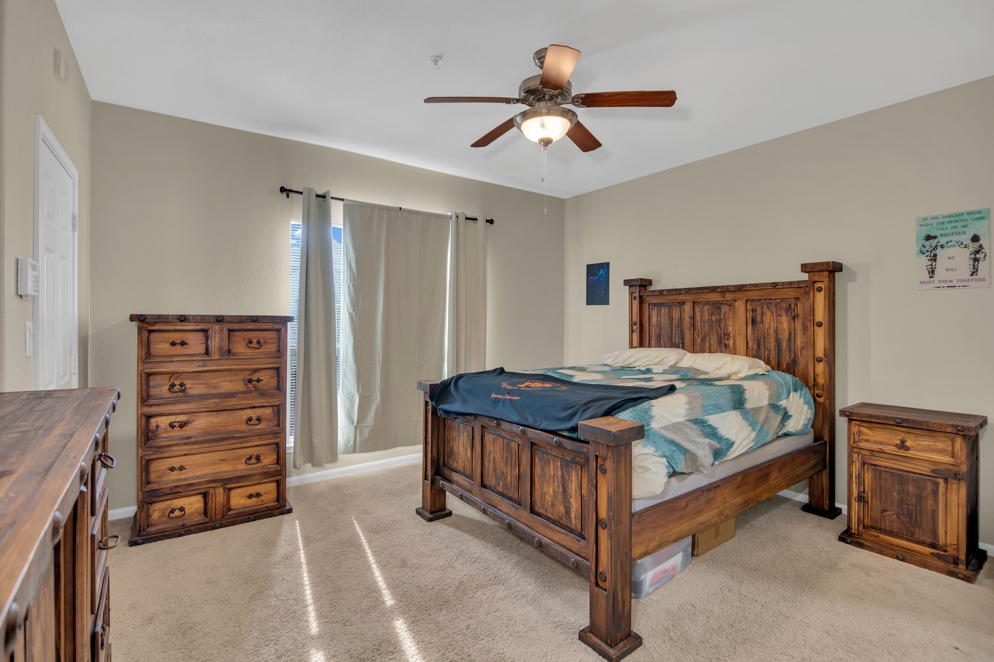 9200 Westheimer Road, Unit 1503 Houston, TX 77063 - Photo 23 of 37 a bedroom with a bed and a ceiling fan