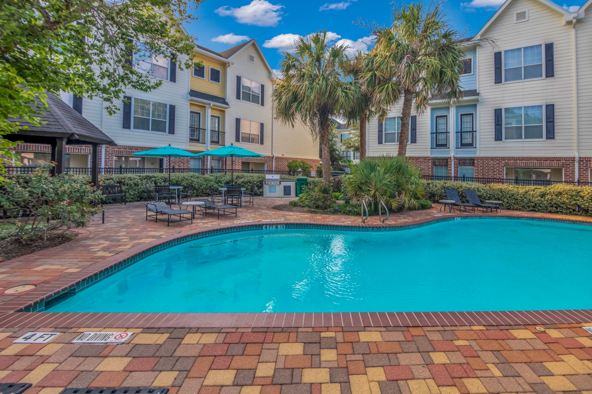 9200 Westheimer Road, Unit 1503 Houston, TX 77063 - Photo 31 of 37 a front view of a building with garden