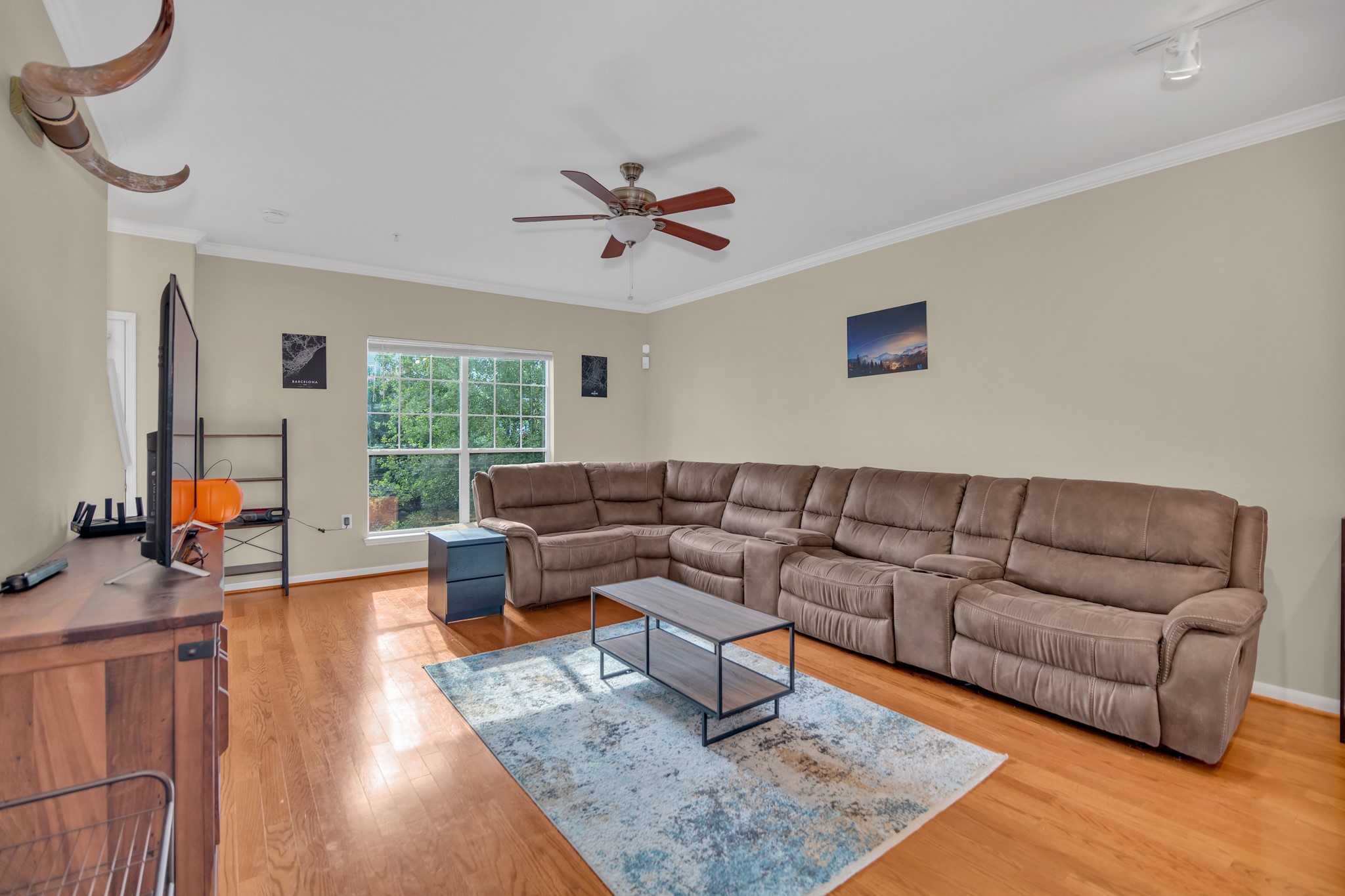 9200 Westheimer Road, Unit 1503 Houston, TX 77063 - Photo 9 of 37 a living room with furniture and a large window