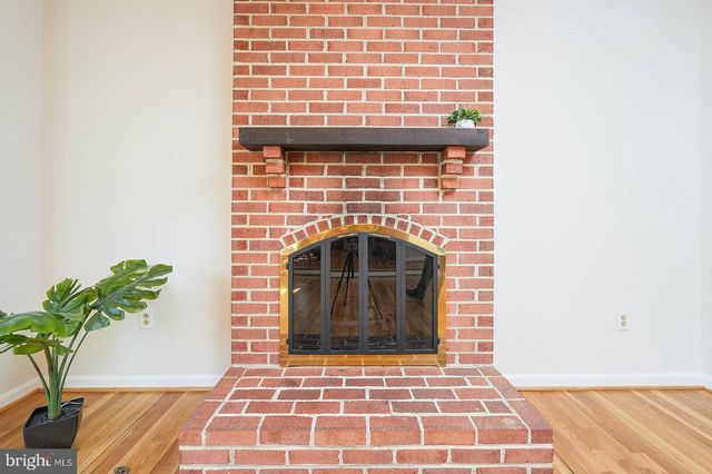 a view of a living room and a floor to ceiling window