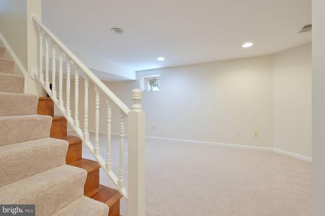 a view of a back yard of the house