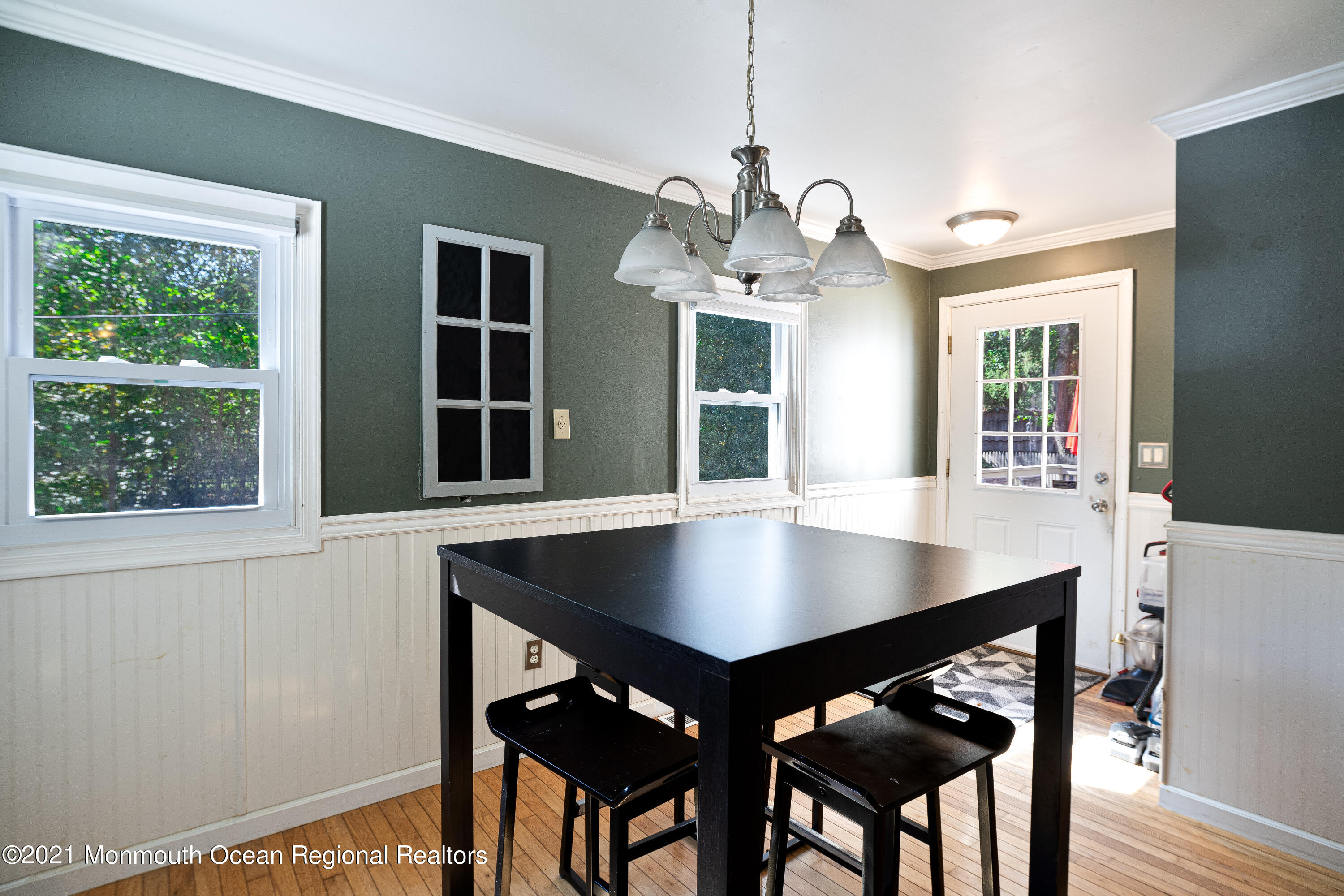229 Lanes Pond Road Howell, NJ 07731 - Photo 11 of 25 a view of a dining room with a table and chairs