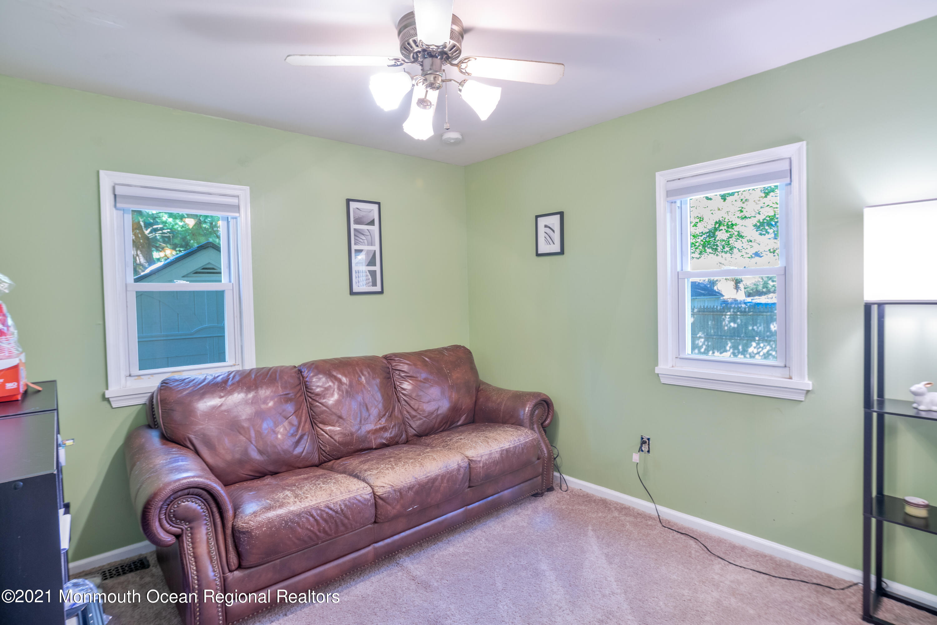 229 Lanes Pond Road Howell, NJ 07731 - Photo 17 of 25 a living room with furniture and a window