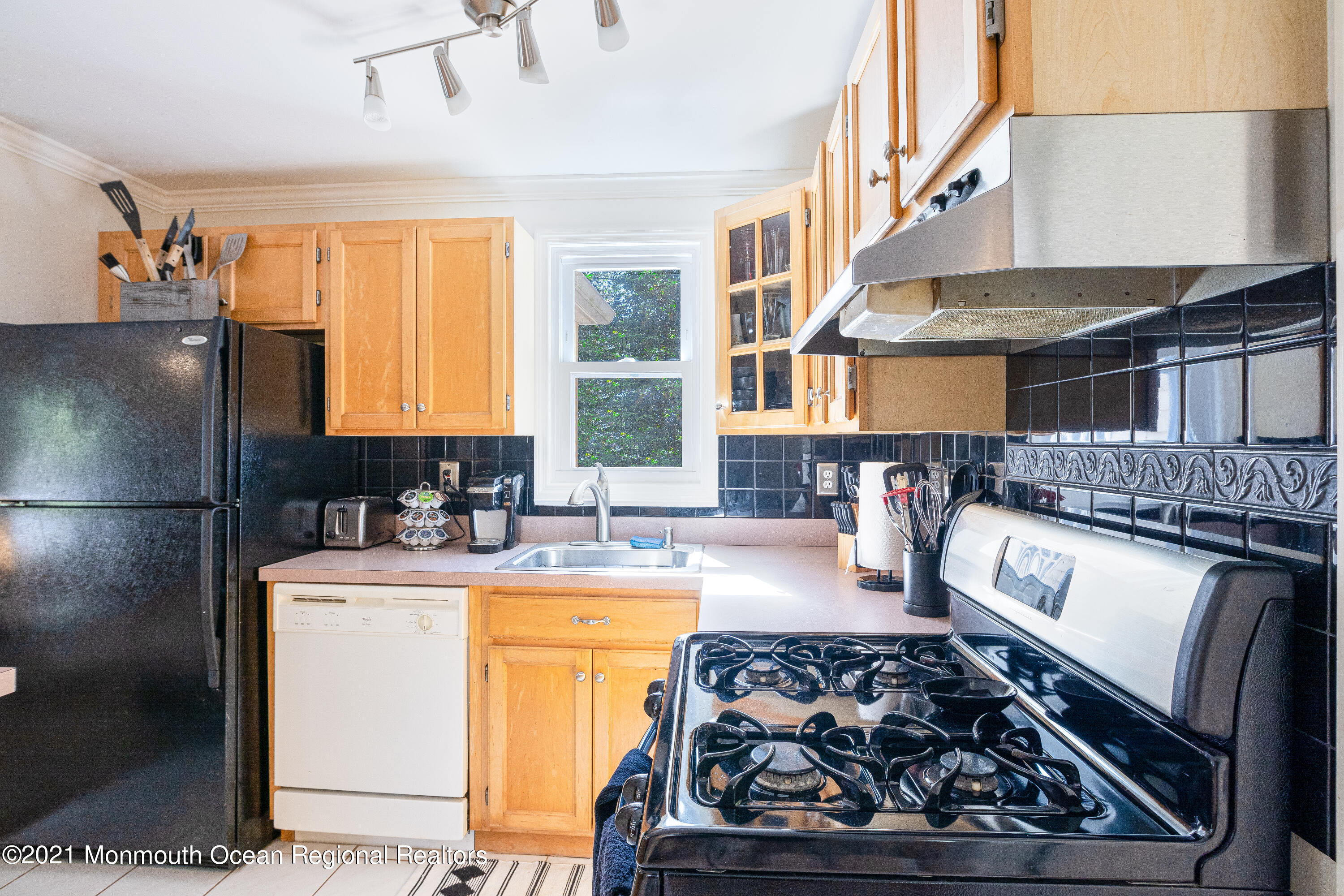229 Lanes Pond Road Howell, NJ 07731 - Photo 18 of 25 a kitchen with sink stove and refrigerator