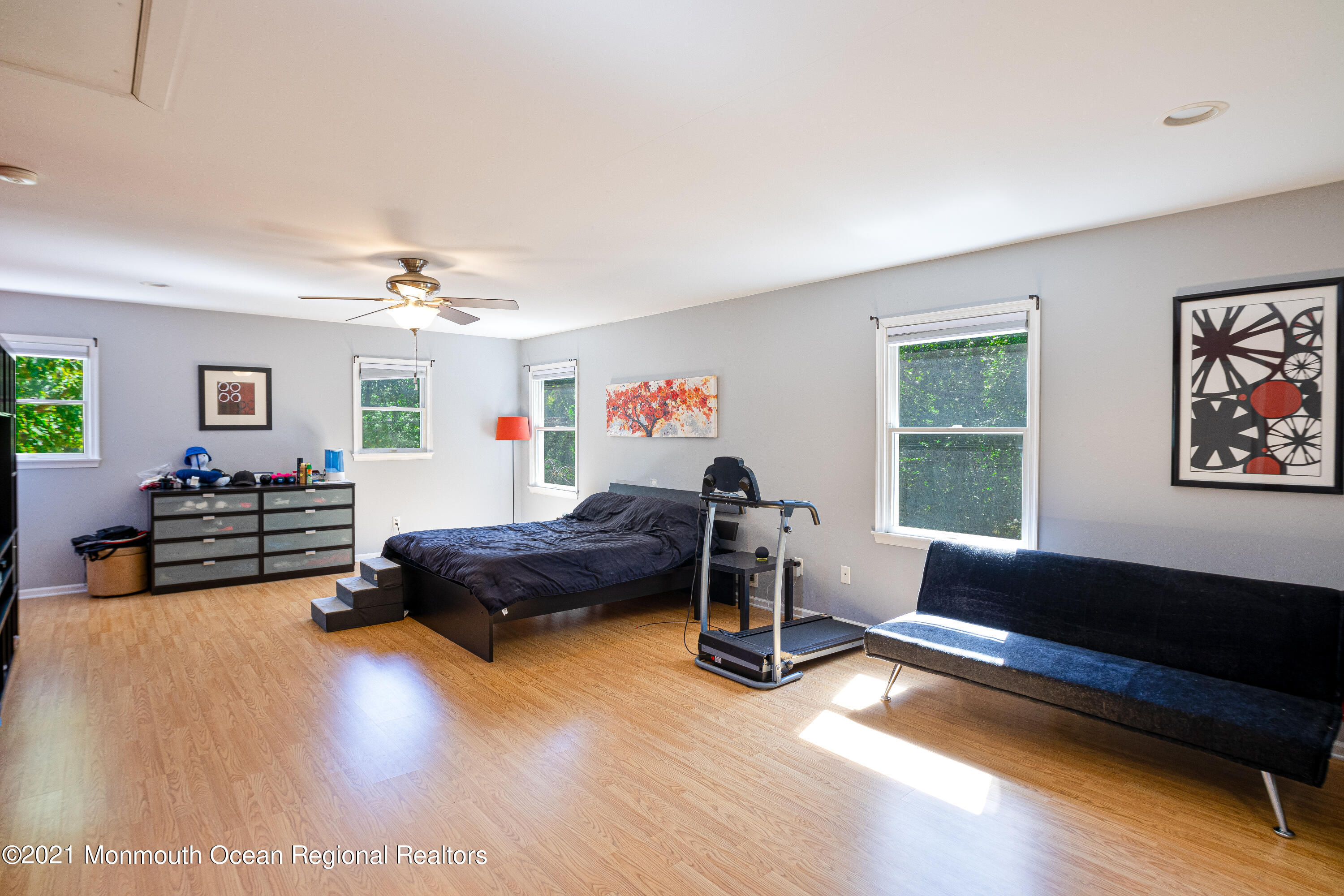 229 Lanes Pond Road Howell, NJ 07731 - Photo 20 of 25 a living room with furniture and wooden floor