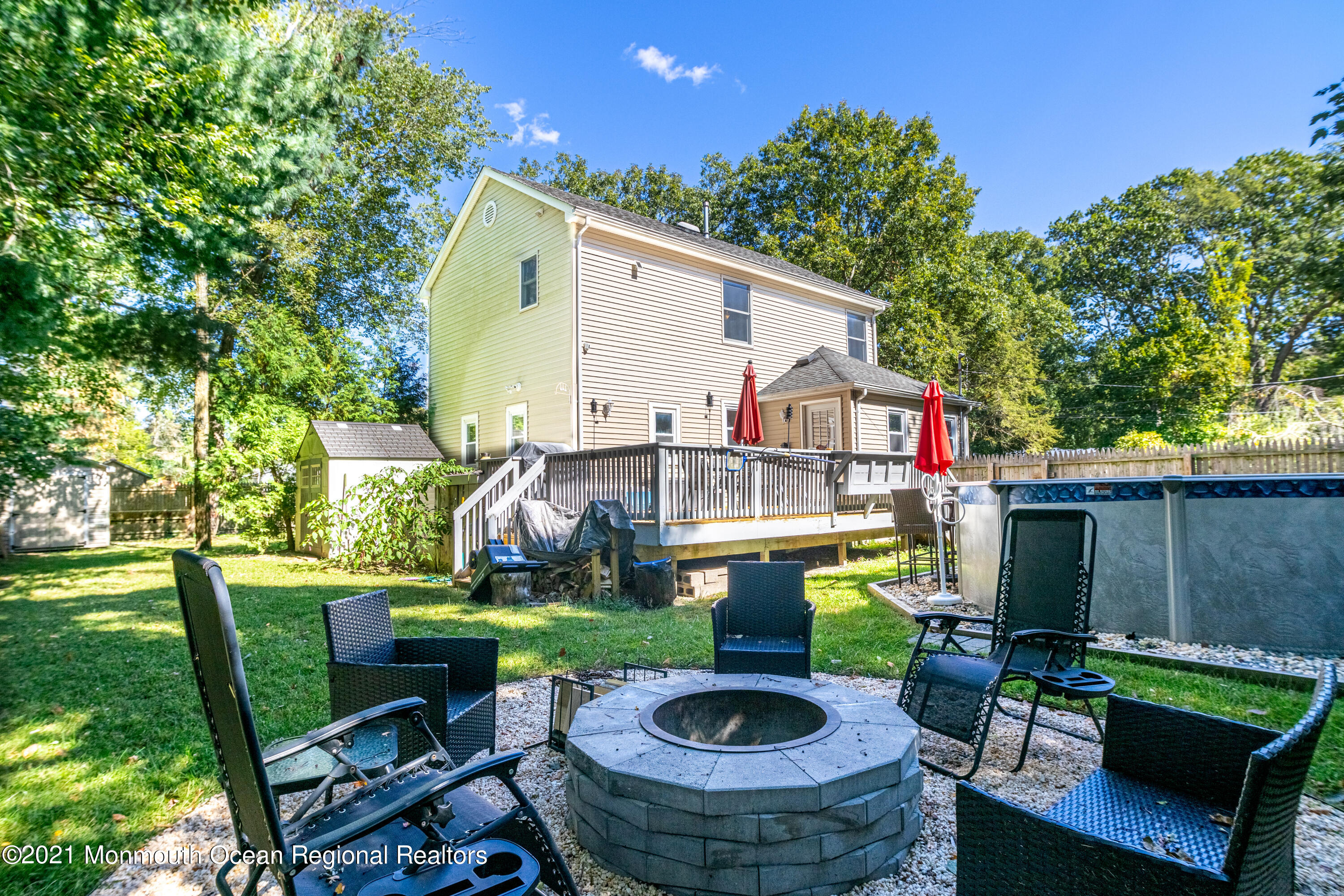 229 Lanes Pond Road Howell, NJ 07731 - Photo 3 of 25 a view of house with backyard and outdoor seating