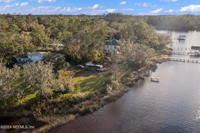 a view of lake with green space