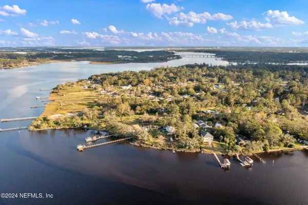 a view of a lake from a yard