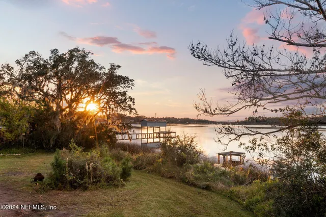 a view of a lake from a yard
