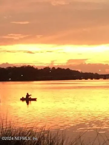 a view of lake with mountain