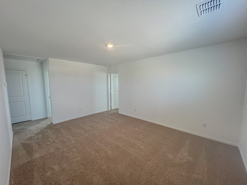 254 The Bad Way Jarrell, TX 76537 - Photo 12 of 24 a view of an empty room