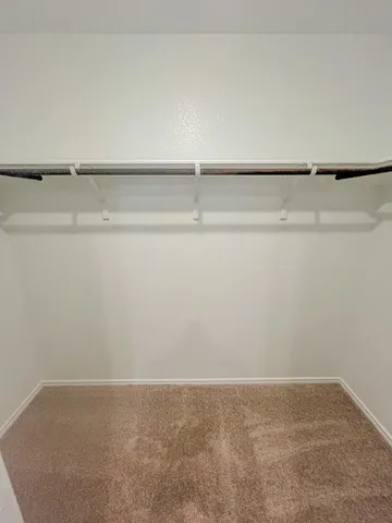 a bathroom with a shower and a bath tub