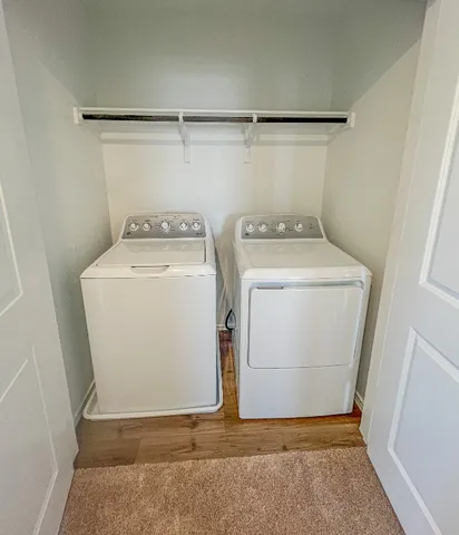 a utility room with dryer and washer