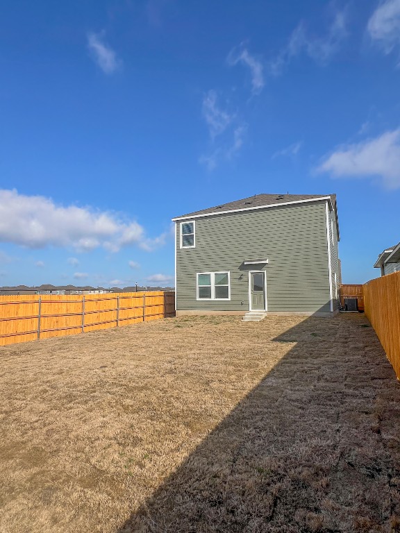 254 The Bad Way Jarrell, TX 76537 - Photo 22 of 24 a view of backyard of house