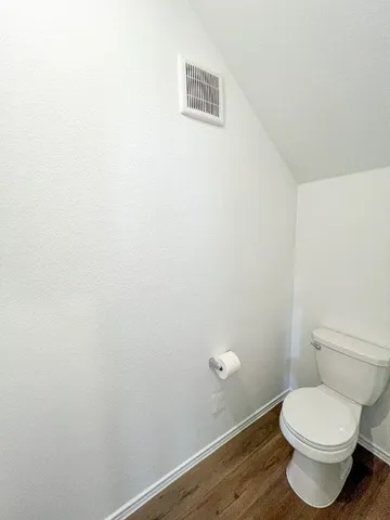 a bathroom with a toilet