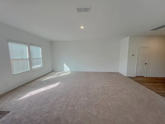 a kitchen with a sink a stove and refrigerator