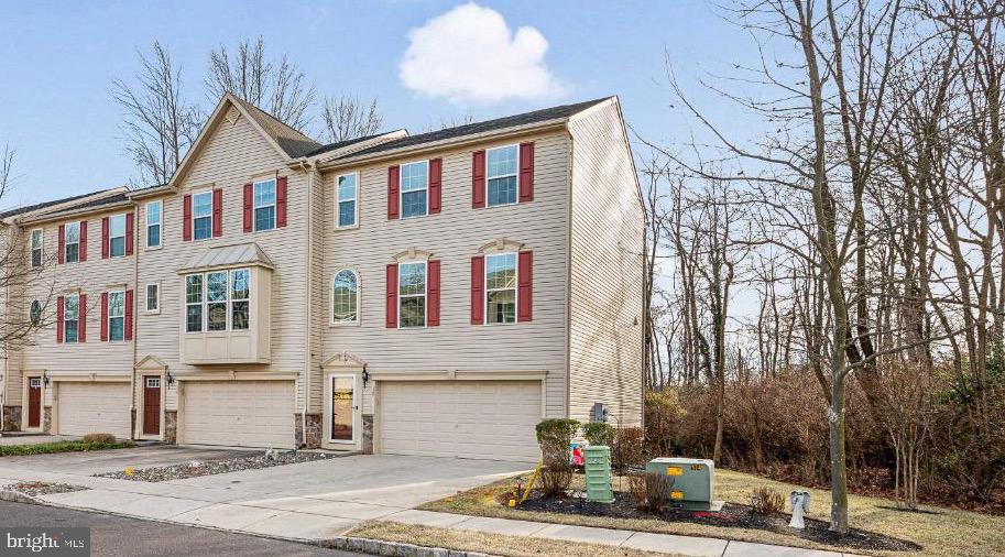 12 Wallace Road Mount Holly, NJ 08060 - Photo 2 of 25 a front view of a house with street