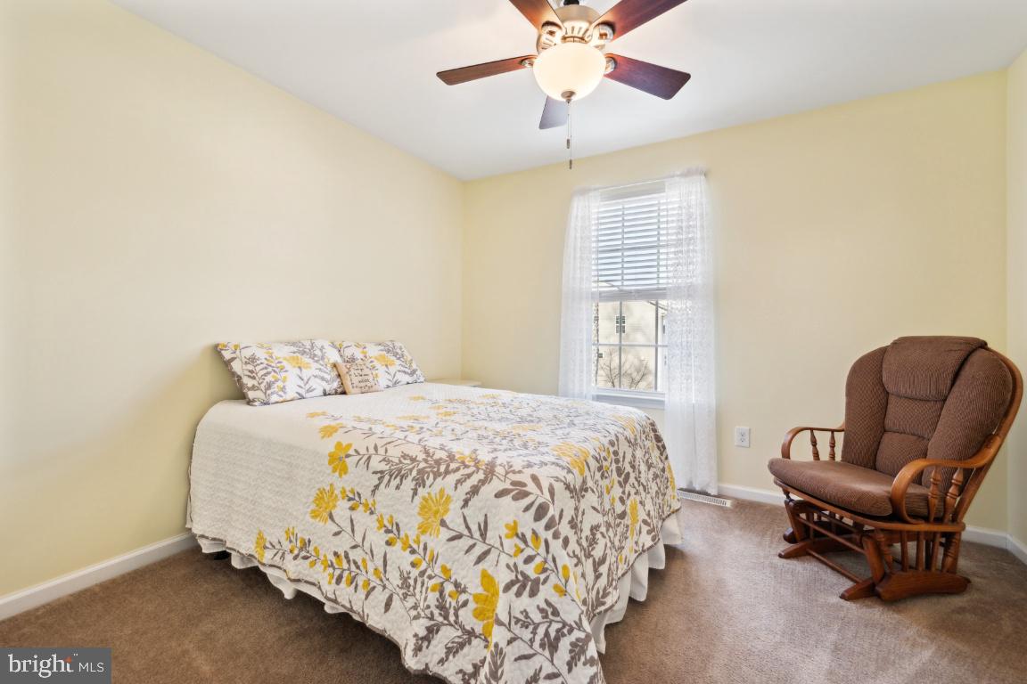 12 Wallace Road Mount Holly, NJ 08060 - Photo 22 of 25 a bedroom with bed and chair