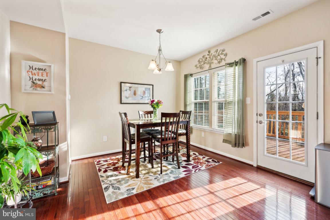 12 Wallace Road Mount Holly, NJ 08060 - Photo 5 of 25 a view of a dining room with furniture window and wooden floor
