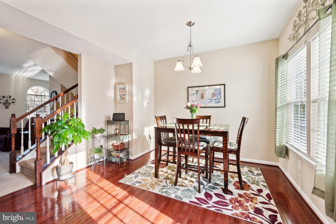 12 Wallace Road Mount Holly, NJ 08060 - Photo 6 of 25 a view of a dining room with furniture window and wooden floor
